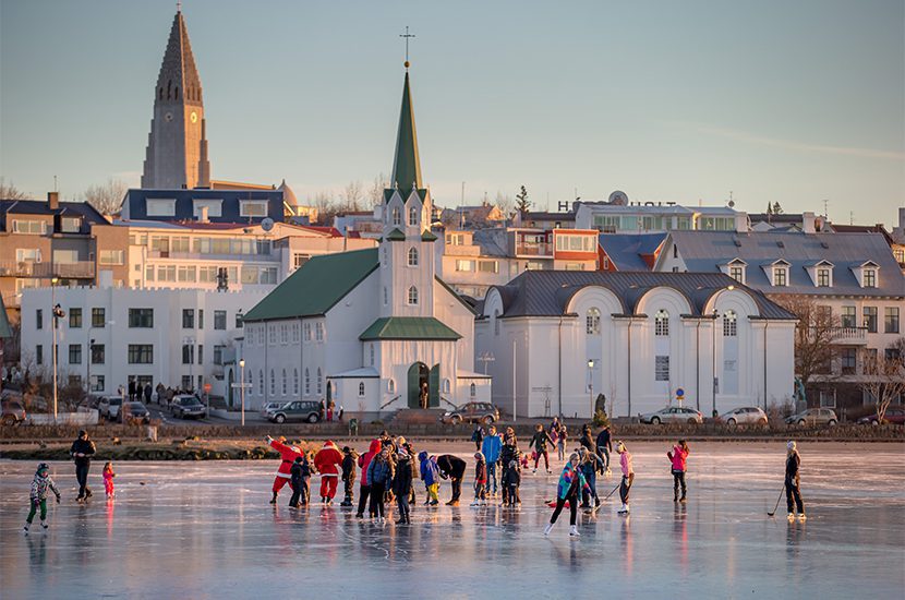 Skating on Tjörnin, the Reykjavik City Pond, Iceland
