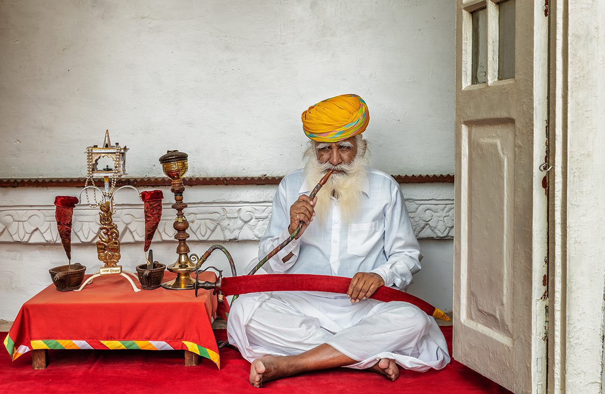 Old man smoking water pipe by Mark52